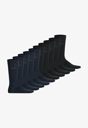 Pack de 12 calcetines en tonos oscuros de azul marino y negro, hechos de un material suave y liso con un borde acanalado y un pequeño detalle de logo.