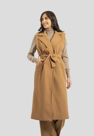 SANS MANCHES UCLA - Manteau court - beige