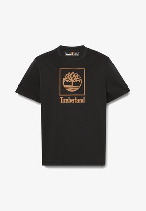 Czarna koszulka z krótkim rękawem i okrągłym dekoltem z dużym brązowym logo drzewa Timberland oraz nazwą marki umieszczonymi na środku przodu.