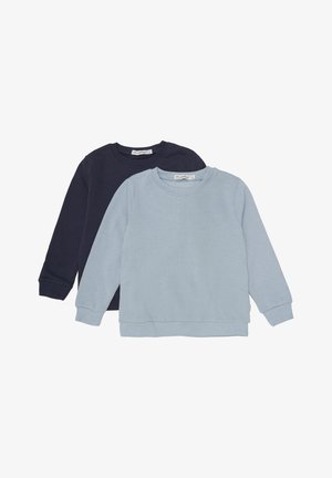 Two long-sleeve sweatshirts: one in navy blue and one in light blue. Both have ribbed cuffs and crew necks, made of soft fabric.