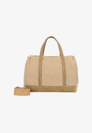 Beige textured tote bag made from faux fur with suede accents. Features two top handles and a detachable strap with logo detail.