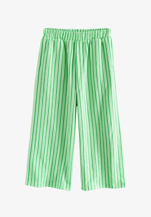Bukser med vide ben med grønne lodrette striber og elastisk talje, lavet af let tekstureret stof.