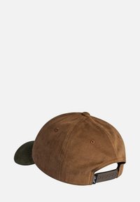 Brown cap with a green visor, made of textured fabric. Features a snapback closure and stitched detailing. No visible logos or patterns.