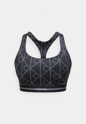 Μαύρο αθλητικό σουτιέν με γκρι γεωμετρικό σχέδιο από κουκκίδες, σχέδιο racerback και λογότυπο Calvin Klein στη ελαστική ταινία στο κάτω μέρος.