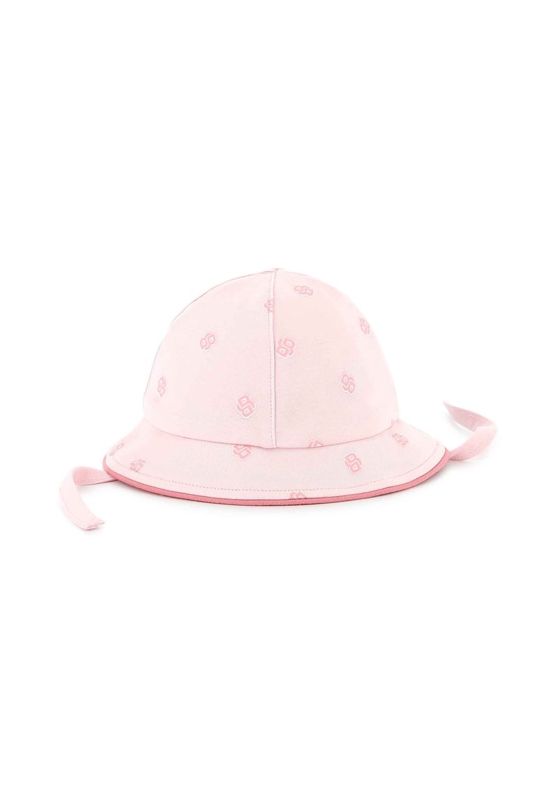 Chapeau seau rose fait de tissu doux. Présente un design à motifs avec des accents de logo et des lanières sur les côtés pour le maintenir en place.