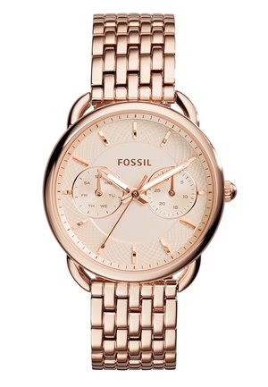 Rose gold Fossil armbåndsur med sammenkoblet metalrem, rund urskive, timemarkører, to undermålere til dag og dato samt tre visere.