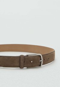Brown suede belt with a smooth inner lining, silver metal buckle, and multiple adjustment holes along the strap.