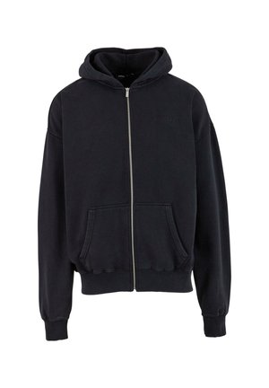 Tumši zils zipa jaku džemperis, izgatavots no mīksta auduma, ar kapuci, priekšējām kabatām un ribota apakšmala un piedurknēm. Smalka logo detaļa uz krūtīm.