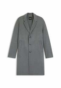Cappotto in lana grigia con rever a punta, tre bottoni, tasche laterali e silhouette dritta. Texture liscia con un design pulito.