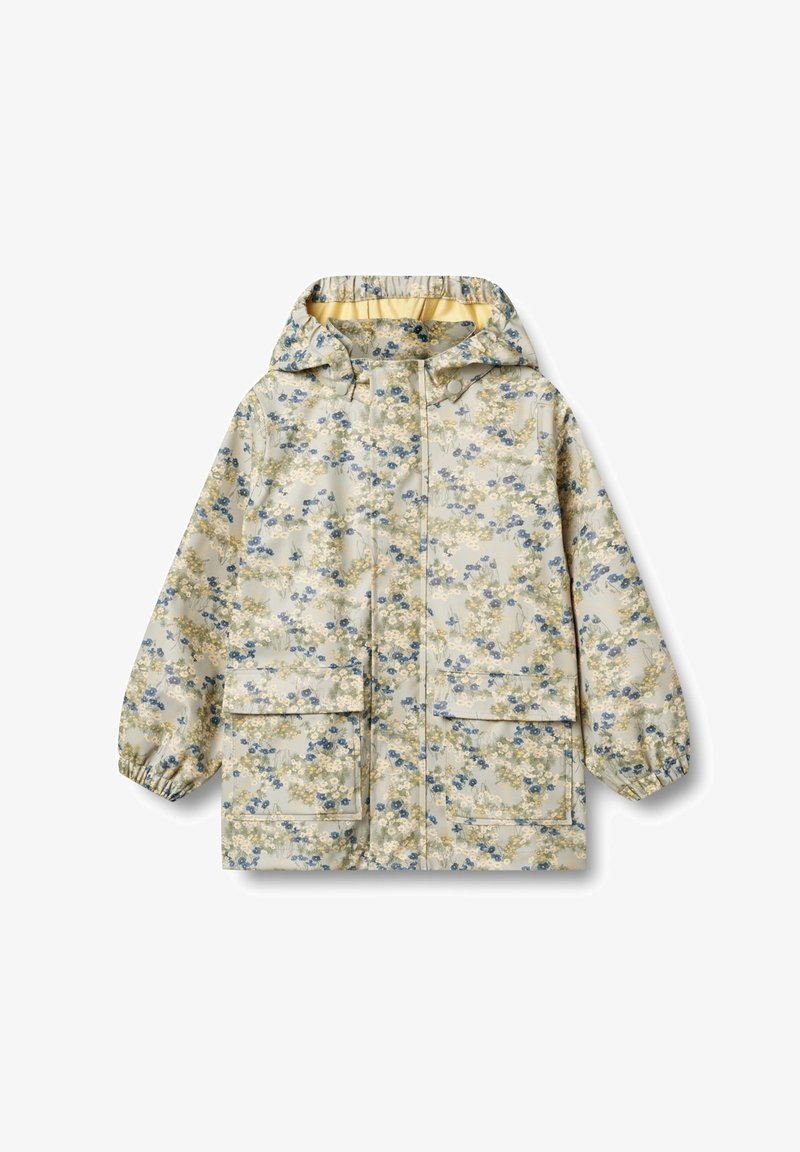 Blommig regnjacka med en ljus beige bakgrund, blåa och gröna blommor, dragkedja framtill och två framfickor med elastiska ärmslut.