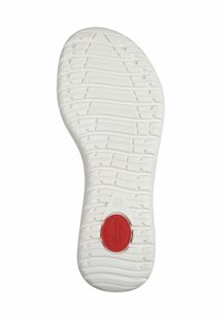 Weiße Gummisohle mit strukturiertem Grip-Muster und einem roten kreisförmigen Akzent, der "Comfort" und die Größenangabe 37 enthält.