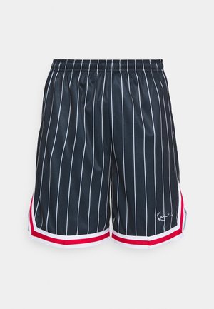 Shorts de sport bleu marine avec fines rayures blanches, taille élastique, accents rouges et blancs sur l'ourlet, et un logo sur le bas à gauche devant.