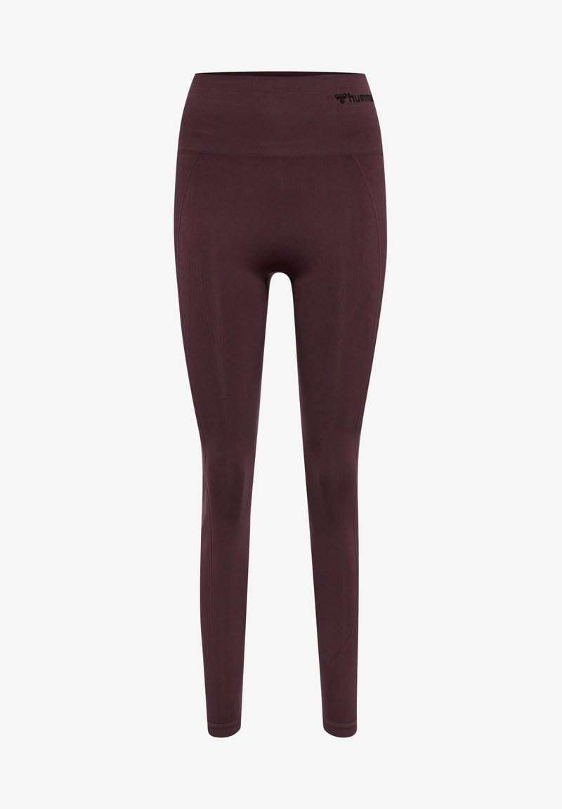 Bordeauxkleurige legging met een hoge tailleband, gemaakt van rekbare stof. Voorzien van een naadloos ontwerp en subtiele textuurdetails overal.