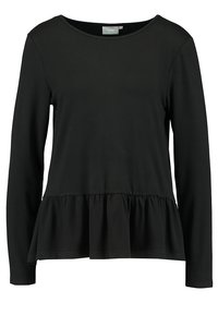 Maglietta nera a maniche lunghe in morbido tessuto, con scollo rotondo e orlo a peplum per una forma più ampia in vita.