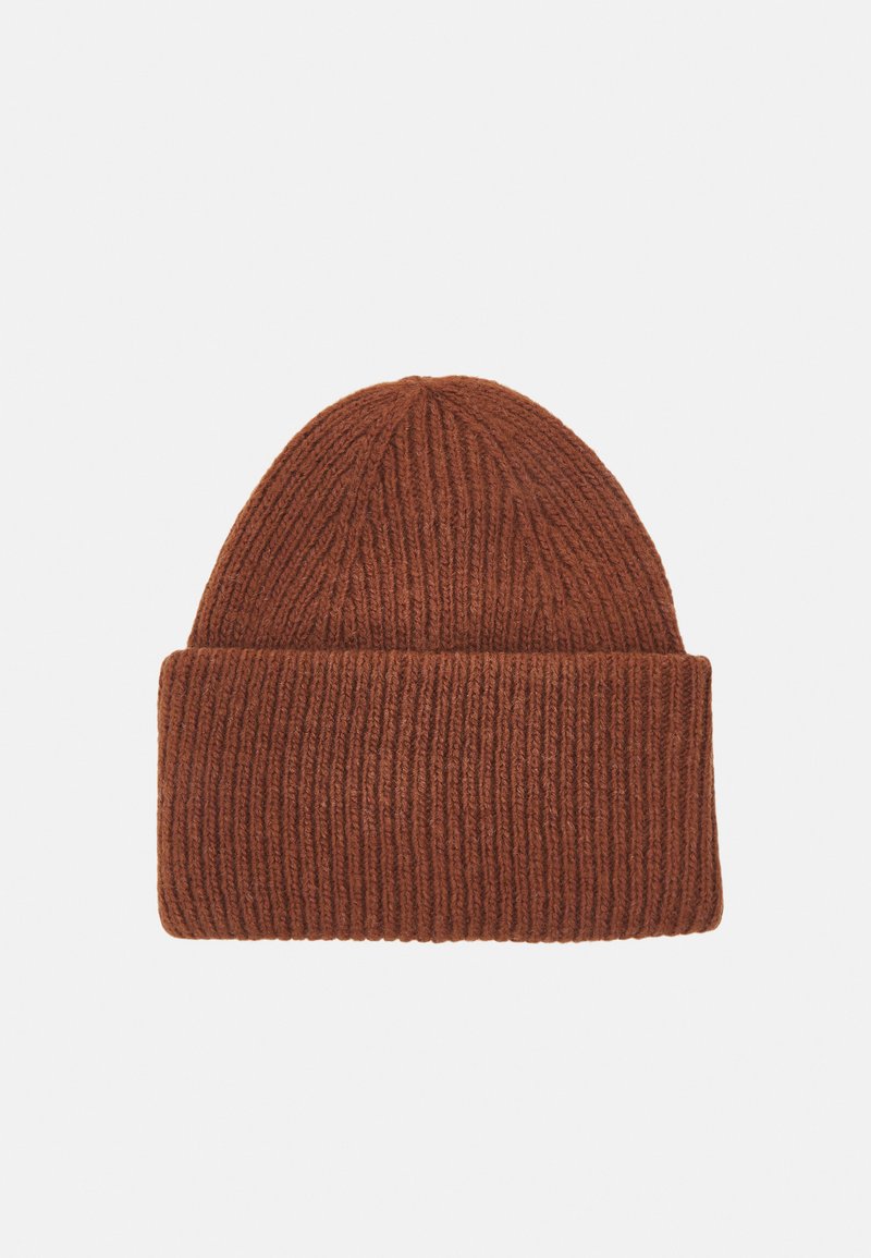 Brown knitted beanie made of soft fabric, featuring a ribbed texture and a folded cuff at the base. Rounded crown design.