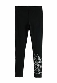 Fekete leggings rugalmas anyagból, az alsó bal lábon egy karakter fehér körvonalas mintájával. Kiválóan illeszkednek és sima textúrával rendelkeznek.