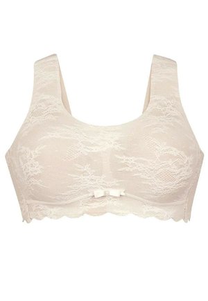 Spitzen-BH in Creme mit breiten Trägern, floralem Muster und einer kleinen Schleifen-Detail in der Mitte. Gezackte Kanten entlang des unteren Randes.