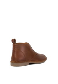 Brown leather ankle boot with a smooth texture, rounded toe, textured side, five eyelets for laces, and a pull tab at the heel.