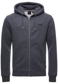 Grijze hoodie met ritssluiting, gemaakt van zacht fleece materiaal, met een capuchon met trekkoord, steekzakken aan de voorkant en een logo op de borst. Voorzien van geribbelde manchetten.