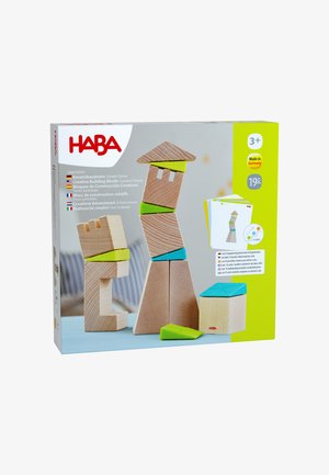 Holzbausteine für kreative schräge Türme mit bunten Verbindern, inklusive Vorlagenkarten, geeignet für Kinder ab 3 Jahren.