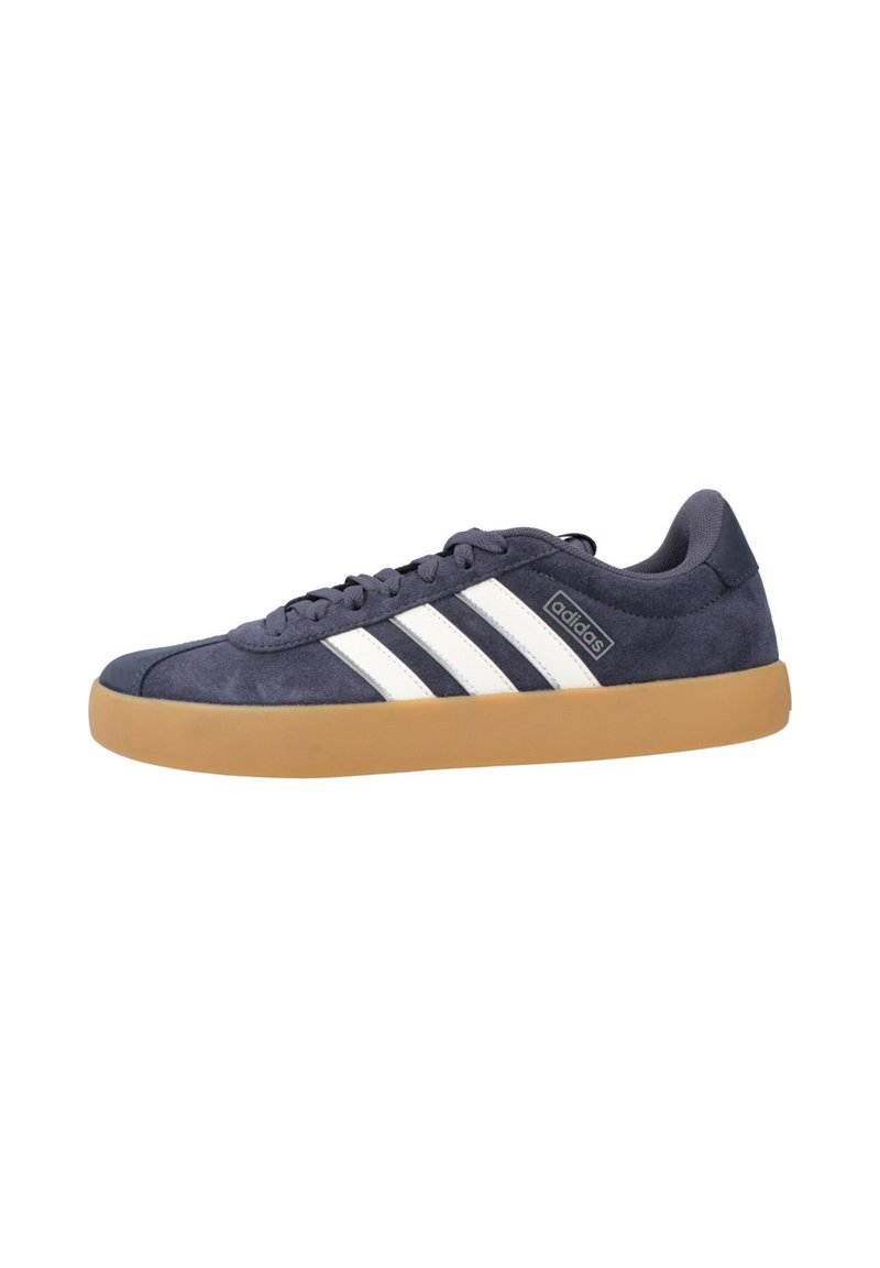 Navy suede sneakers with white stripes, rounded toe, and gum rubber sole. Features a padded collar and flat laces. Durable design for casual wear.