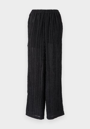 Fekete, bő szárú nadrág texturált csíkos mintával, rugalmas derékkal és könnyű anyagból készült. Kényelmes kialakítás, amely ideális a hétköznapi viselethez.