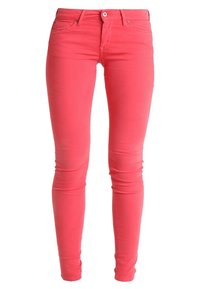 Růžové skinny džíny vyrobené z elastické bavlny, s pěti kapsami, poutky na opasek a zapínáním na zip s knoflíkem.