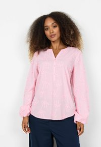 Roze blouse met lange mouwen, textuurrijke bloemrijke borduring, knoopsluiting en elastische manchetten. Zachte stof met een ontspannen pasvorm.