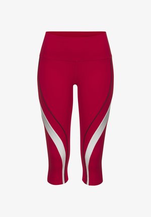 Red capri leggings made of stretchy material. Features white curved accents and black stitching on the sides. High waistband design.