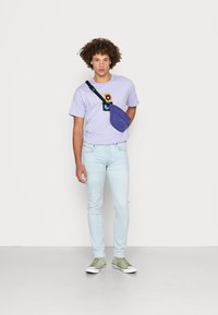 Lee LUKE - Calças de ganga justas - light-blue denim