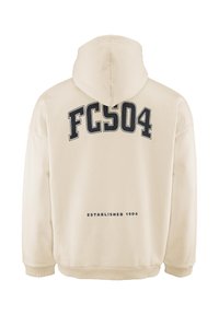Felpa beige con una grande stampa blu scuro "FCS04" sul retro e "ESTABLISHED 1904" in un testo più piccolo sotto. Tessuto morbido, vestibilità comoda.
