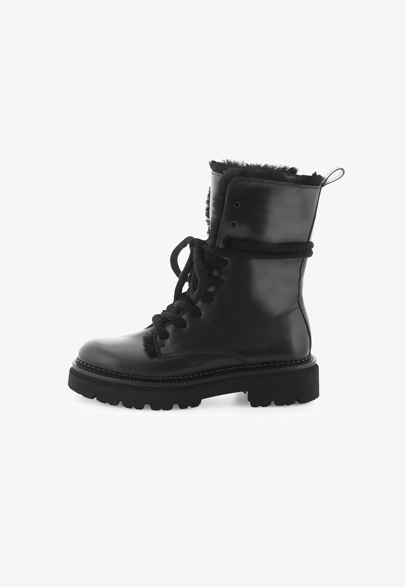 Zwarte leren enkelboot met een robuuste zool, veter sluiting aan de voorkant en een bontvoering aan de bovenkant. Voorzien van een trekband voor gemakkelijk aan- en uittrekken.