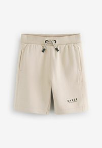 Shorts de algodón beige con cinturilla elástica, cordón con puntas negras, bolsillos laterales y logo "BAKER" en la pierna izquierda.