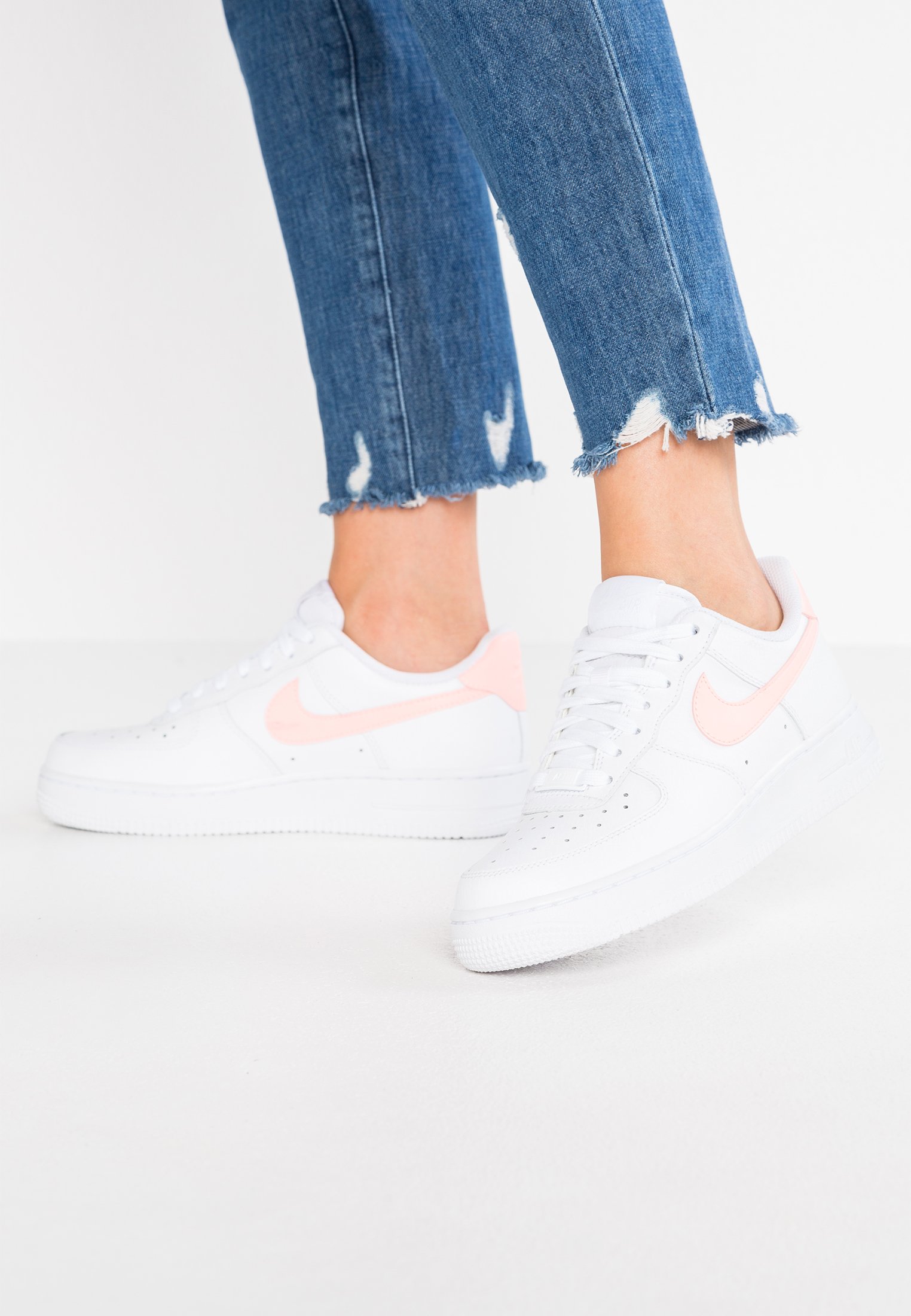 white and light pink air force 1