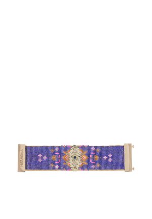 Wide bracelet with blue and multicolored beadwork and a central decorative gold-tone metal embellishment with a dark blue stone.