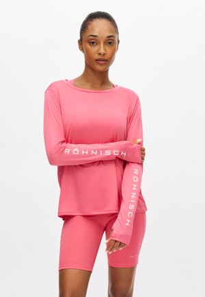 - Bluzka z długim rękawem