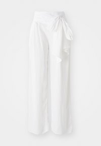 Pantaloni bianchi a gamba larga realizzati in un tessuto morbido e leggero. Presentano una vita con lacci e un design fluido e drappeggiato per facilitare il movimento.