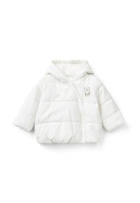 Bílá prošívaná bunda s plyšovou strukturou, kapucí a krátkými rukávy. Na přední straně má malý design králíčka. Měkká vnitřní podšívka.