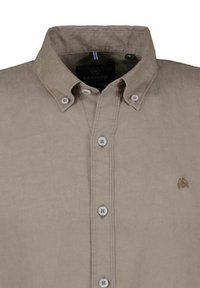 Beige button-up shirt made of cotton, featuring a button-down collar, white buttons, and a small logo embroidered on the chest.