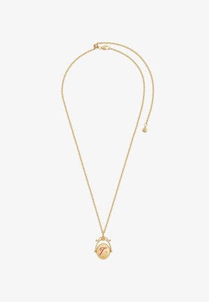 Zlata verižica z ovalnim obeskom, na katerem je rdeče črka "T" in majhni zvezdni vtisi.