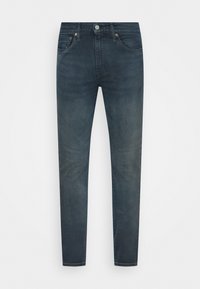 Mörkblå denimjeans med slim fit, med en klassisk femficksdesign, metallknappstängning och subtila slitningar.