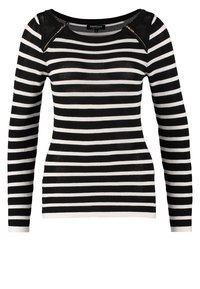 Schwarz-weiß gestreiftes, langärmliges Strickoberteil mit rundem Ausschnitt und strukturierter Stoffqualität. Verfügt über Reißverschlüsse an den Schultern als besonderes Detail.