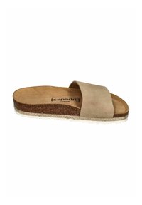 Beige slide sandal with a wide, soft upper strap and a natural cork footbed. The sole features a textured white rubber base with jute detailing.