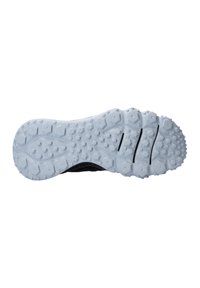 Zwarte atletische schoen zool met een gestructureerde witte rubberen buitenzool, gekenmerkt door hexagonale en cirkelvormige patronen, ontworpen voor grip en duurzaamheid.