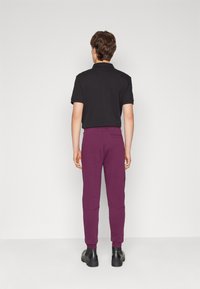 BOSS SESTART - Spodnji deli trenirk - medium purple