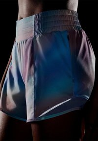 Högmidjade shorts i gradient blå och pastellfärger, gjorda av lättviktigt tyg med elastisk midja och kontrastsömmar.