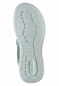 Suola di scarpa in gomma bianca con motivi testurizzati e scanalature. Presenta un logo circolare e una marcatura numerica della taglia. Materiale: flessibile, resistente.