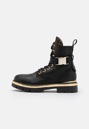 Botines con plataforma - black