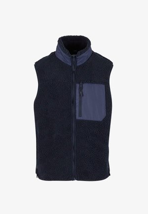 Tengeri kék fleece mellény magas gallérral, textúrált testtel, és egy szilárd anyagú, cipzáras zsebbel a bal mellen. Cipzáras záródás elöl.