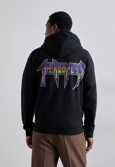 Hanorac negru cu un logo multicolor "The Kooples" în stil graffiti pe spate. Caracteristici: buzunar tip cangur și manșete cu rigle.